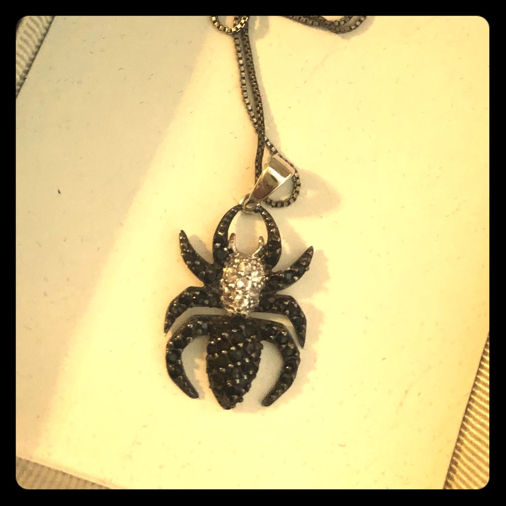 Lab created black diamond spider necklace.